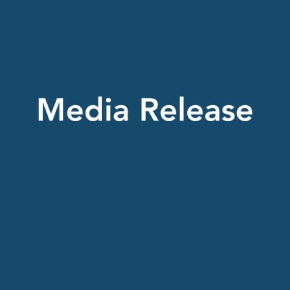 Blue image with the words "Media Release"